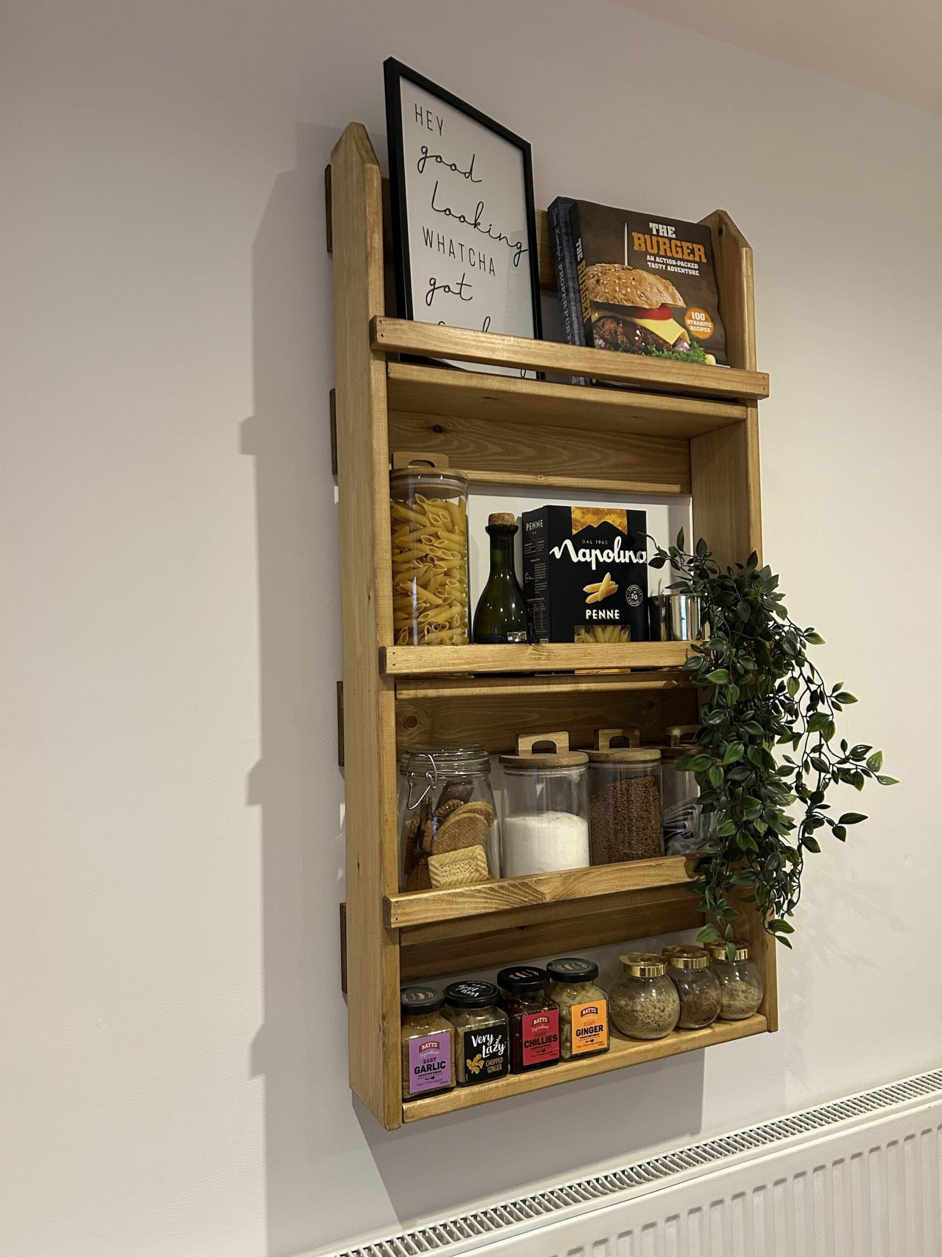 Handmade wooden kitchen wall unit with rustic character and grain marks